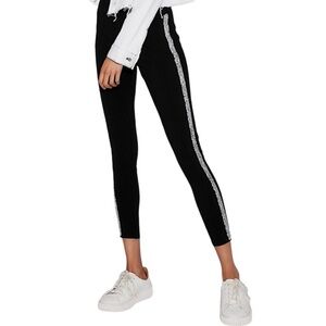 Express
Black leggings
tuxedo silver beaded stripe down side
XS
New with tag
